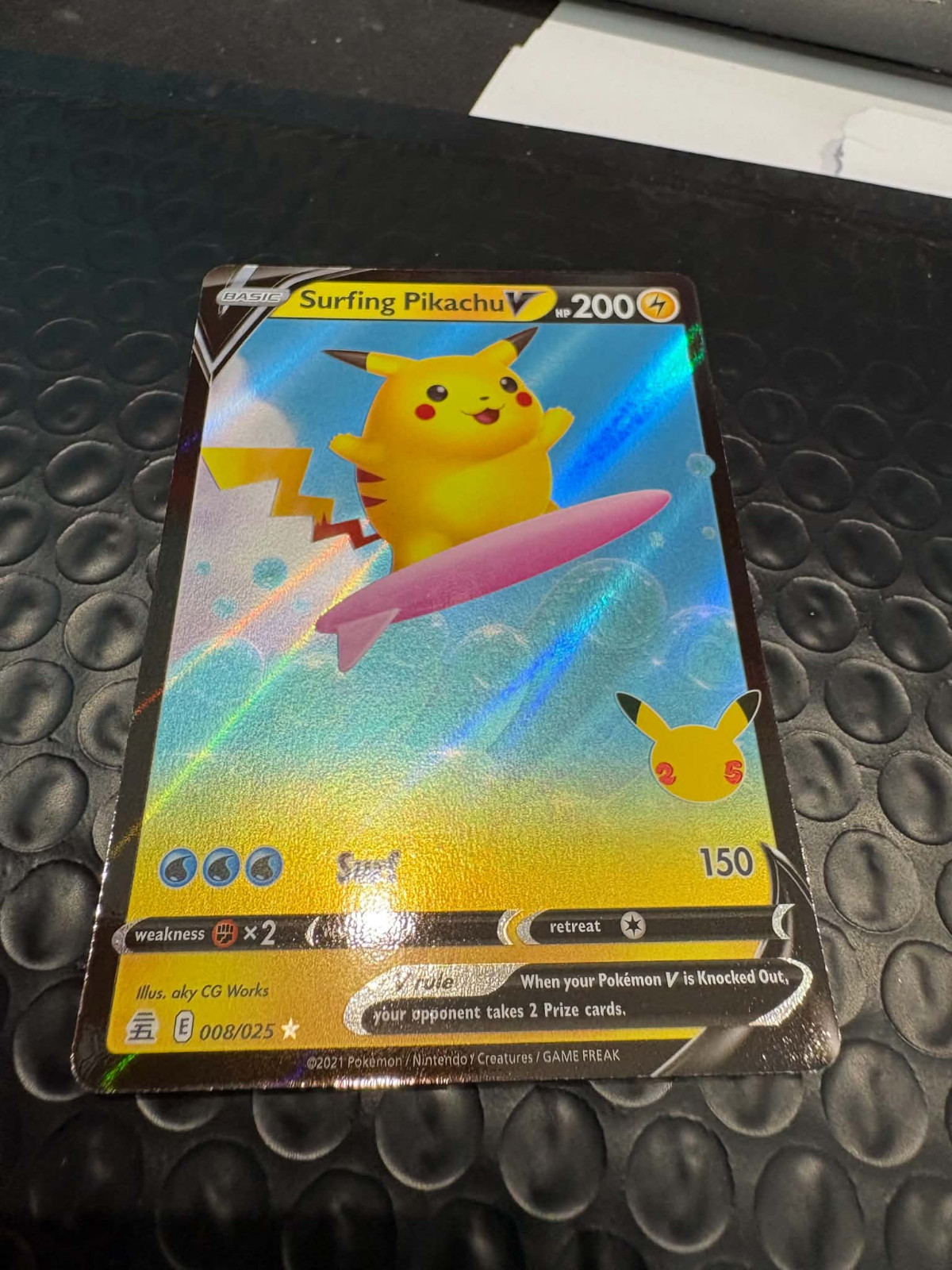 Surfing Pikachu V 008/025 – Celebrations – Pokemon Card – Near Mint