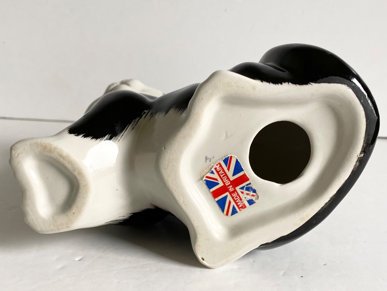 CAT FIGURINE CERAMIC BLACK & WHITE YELLOW EYES SITTING 6.25″ HIGH VINTAGE UK