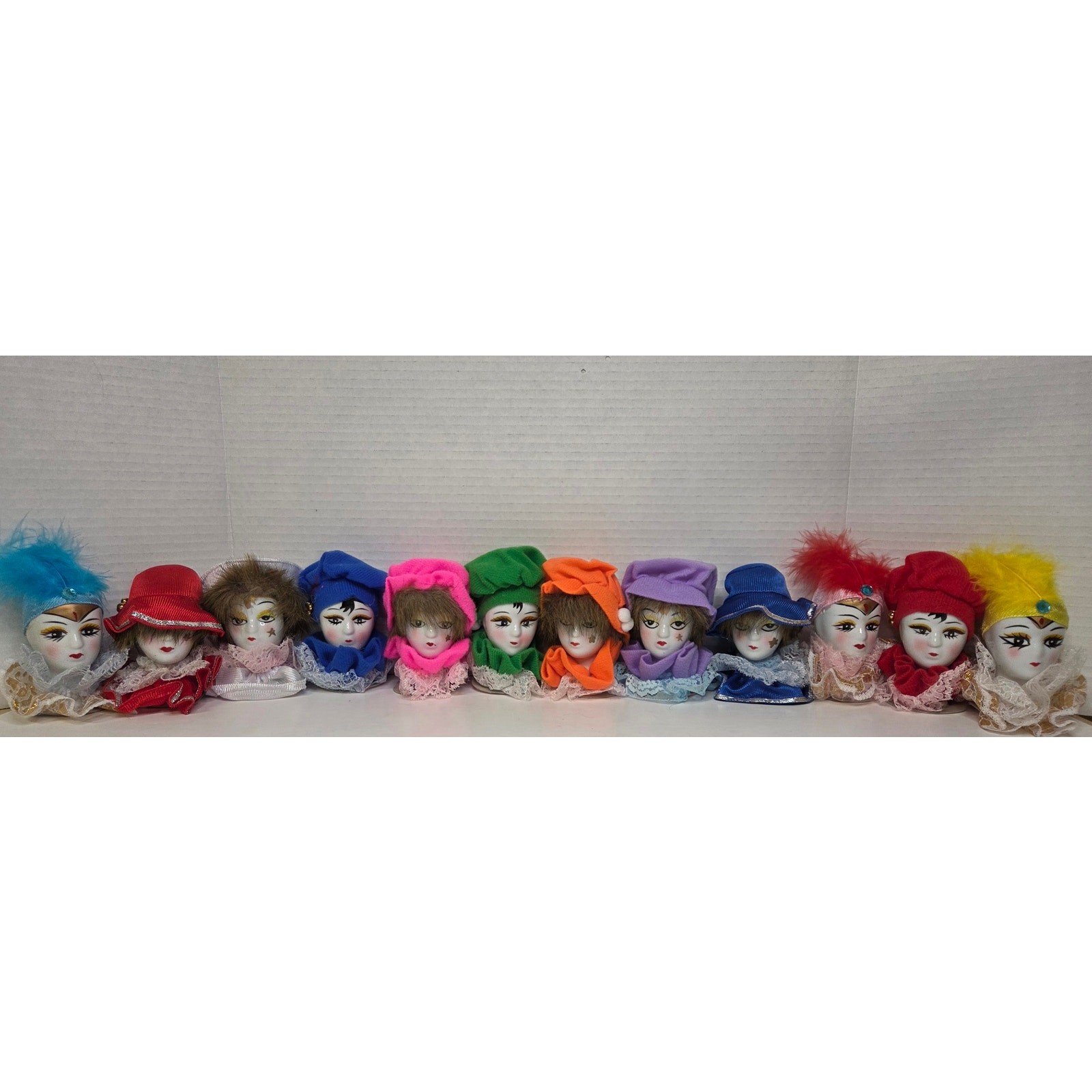 Vintage Porcelain Harlequin Clown Doll Heads – Set of 12 Colorful Jester Faces