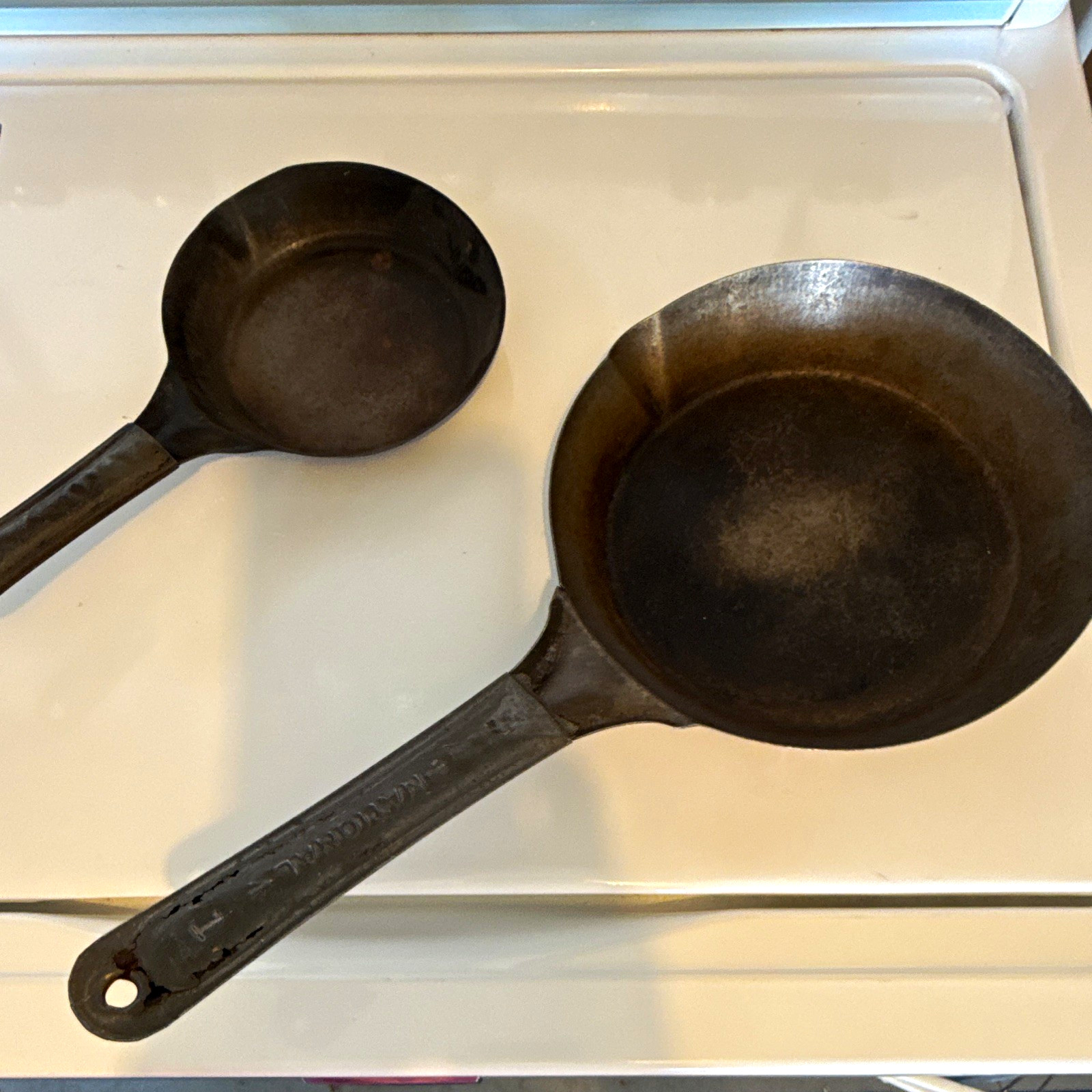 Two Vintage Steel Cold Handle Frying Pans, including a National