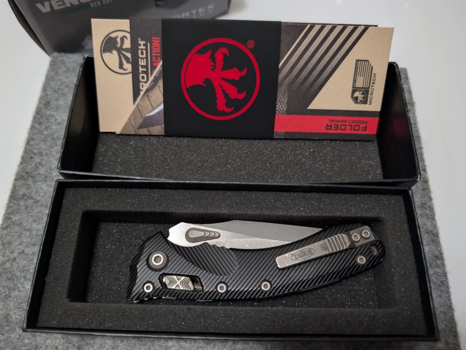 Microtech Amphibian Ram-Lok Stonewashed Black Fluted Aluminum Folding Knife