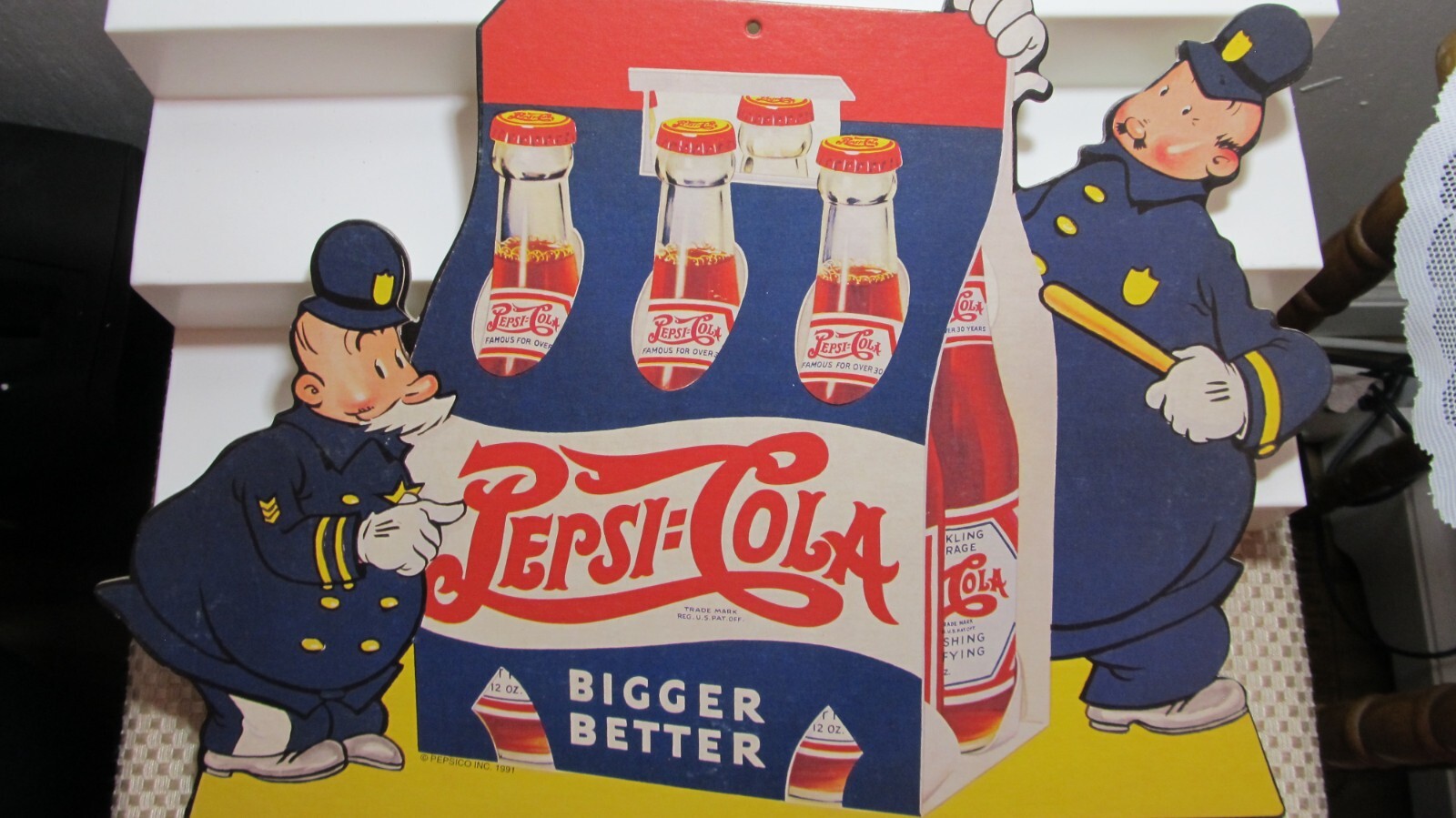 PepsiCo Inc. 1991 Pepsi Cola Cops Bigger Better Cardboard Sign by Nostalgia Ink