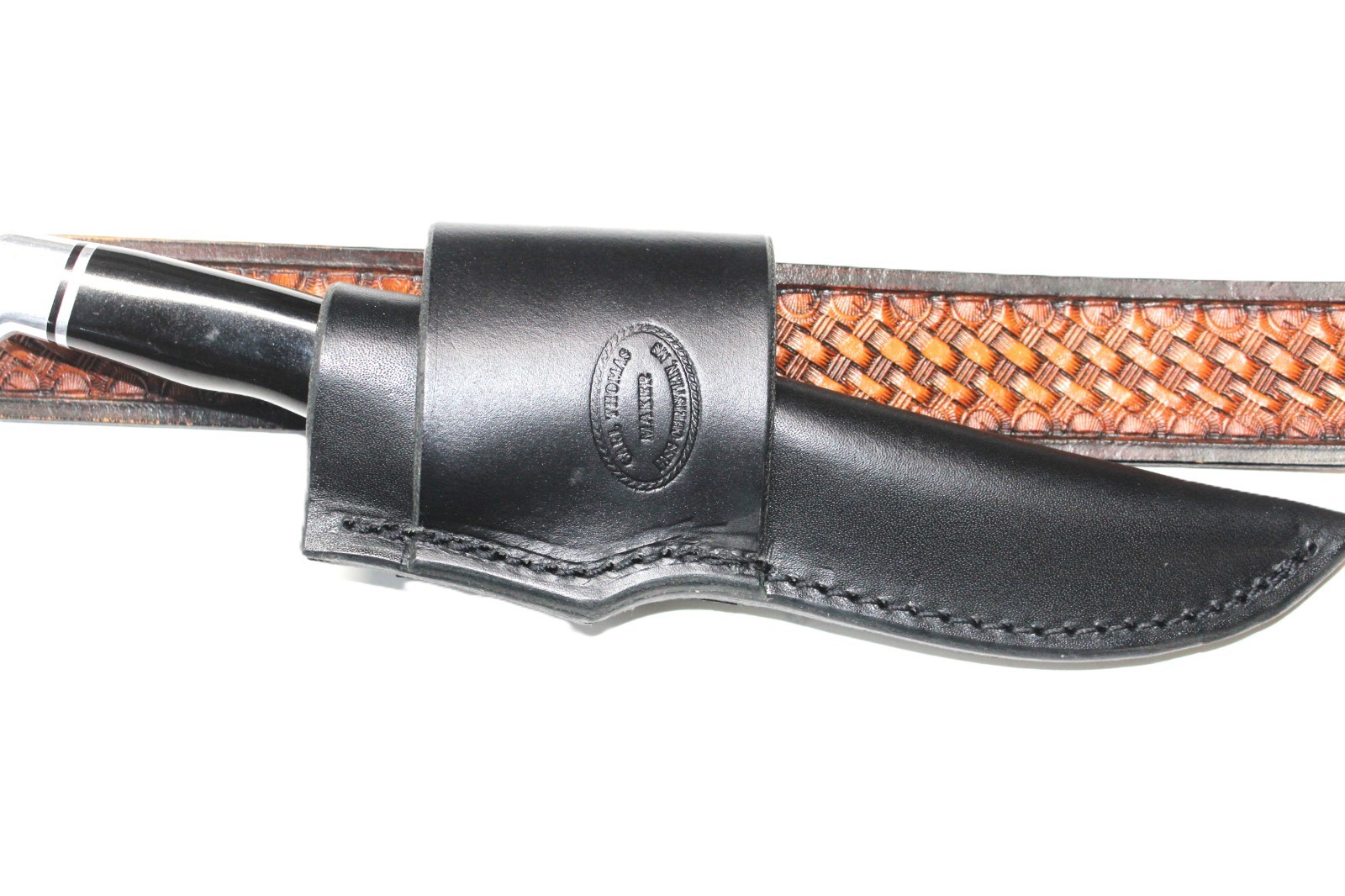 Leather cross draw sheath. Made to fit a Buck 105. Black.