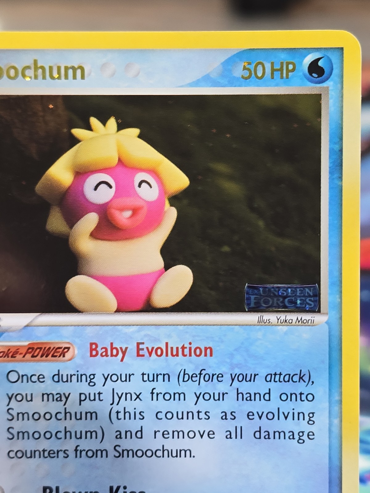 Smoochum 31/115 Reverse Holo Stamp EX Unseen Forces English Pokemon Card. NM