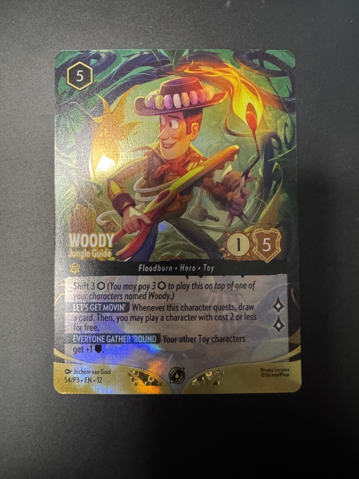 Disney Lorcana TCG Woody – Jungle Guide Foil 54/P3 Store Championship Promo