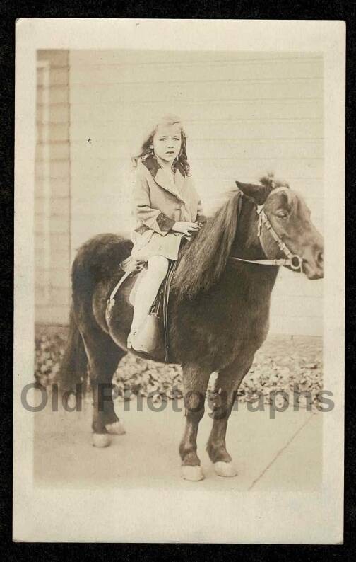 RPPC KID GIRL HORSEBACK PONY RIDE SIDEWALK OLD/VINTAGE PHOTO- A3