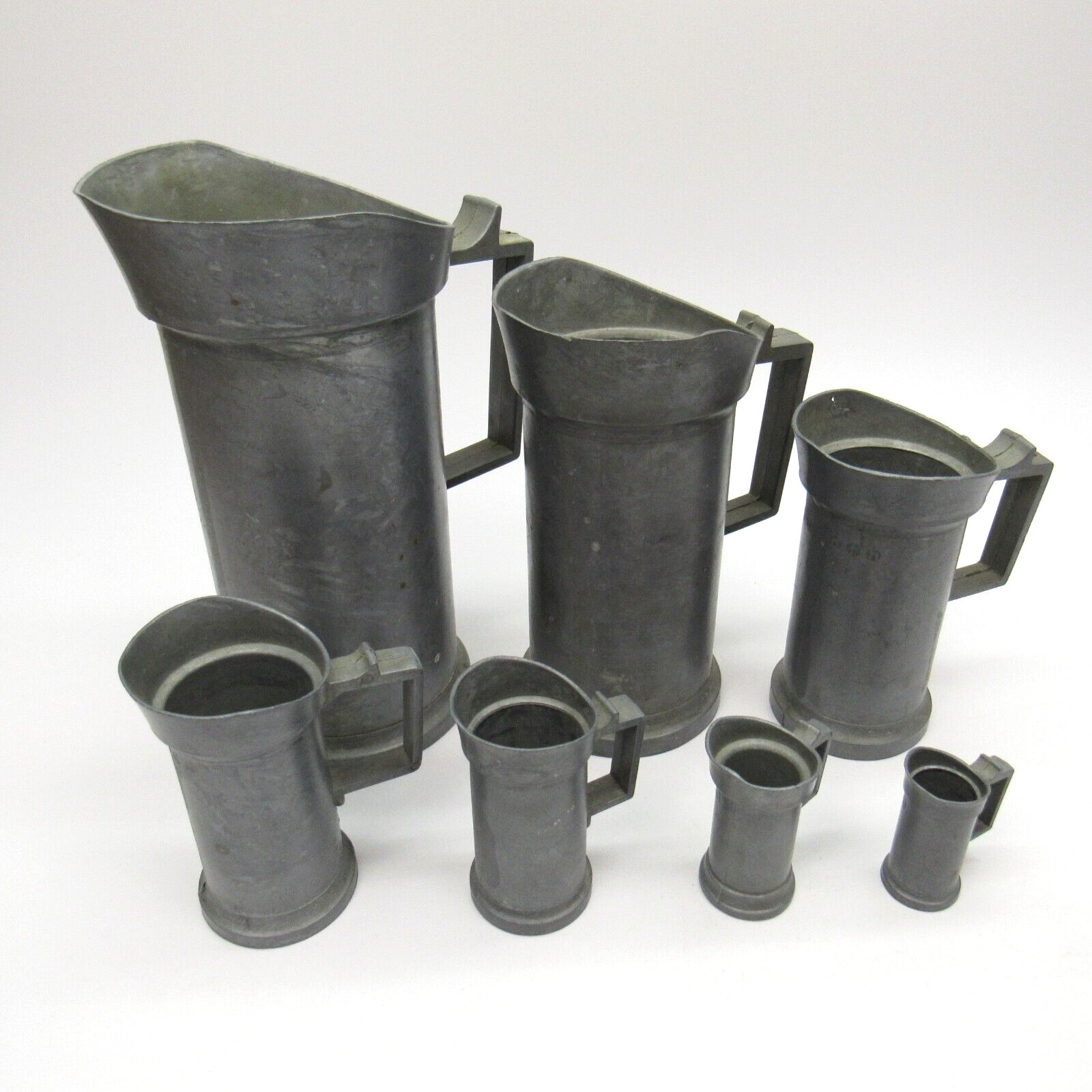 English 19th Century 7 Piece Pewter Pitcher METRIC Antique Measuring Cup Set