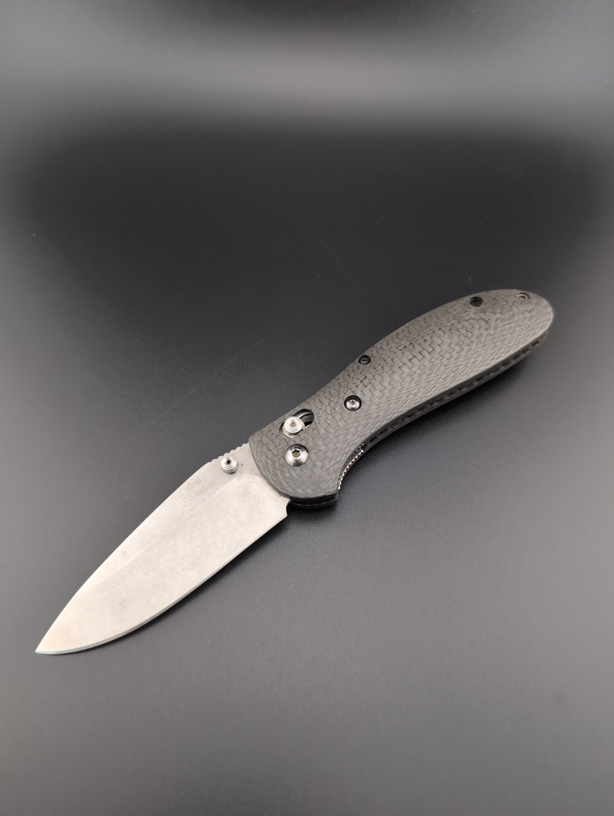 Benchmade 552 – Griptilian Doug Ritter M390 Washed Blade Carbon Fiber – BS-77