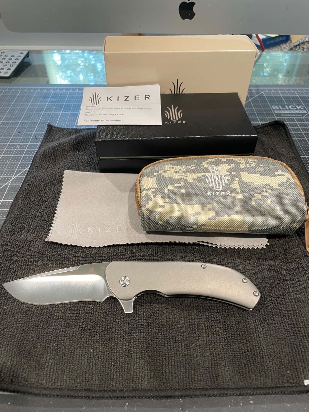 Kizer Eliminator 2- Titanium scales w/ CPM S35VN steel