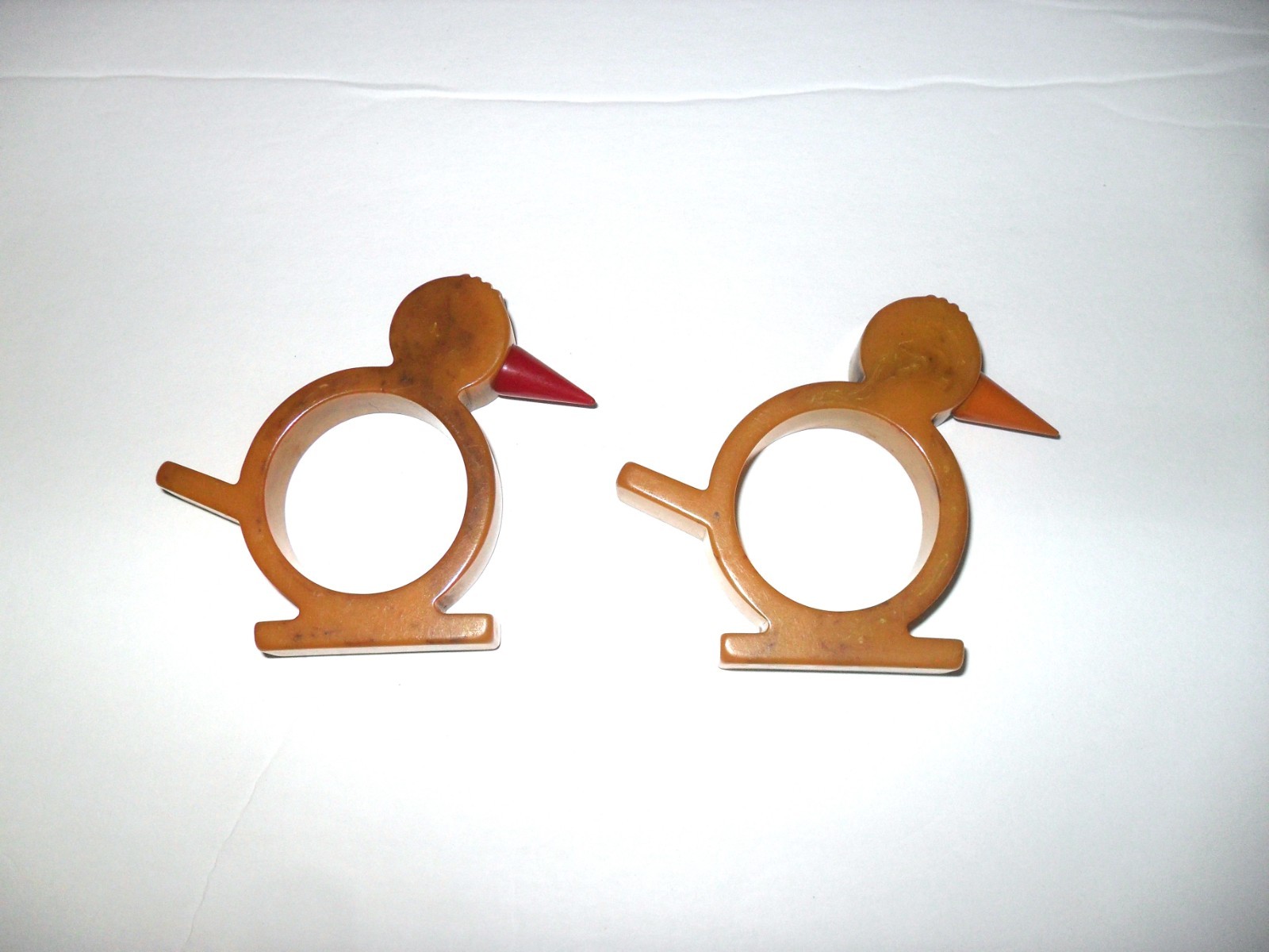 Vintage Pair Bakelite Napkin Rings Bird Chick Duckling Butterscotch One Red Beak