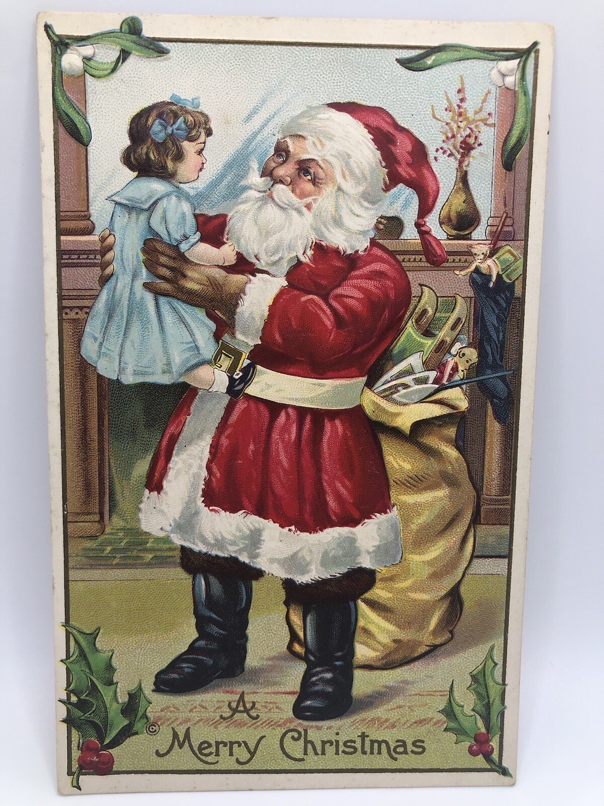 Postcard A Merry Christmas Greeting Doll and Toys Embossed Unposted