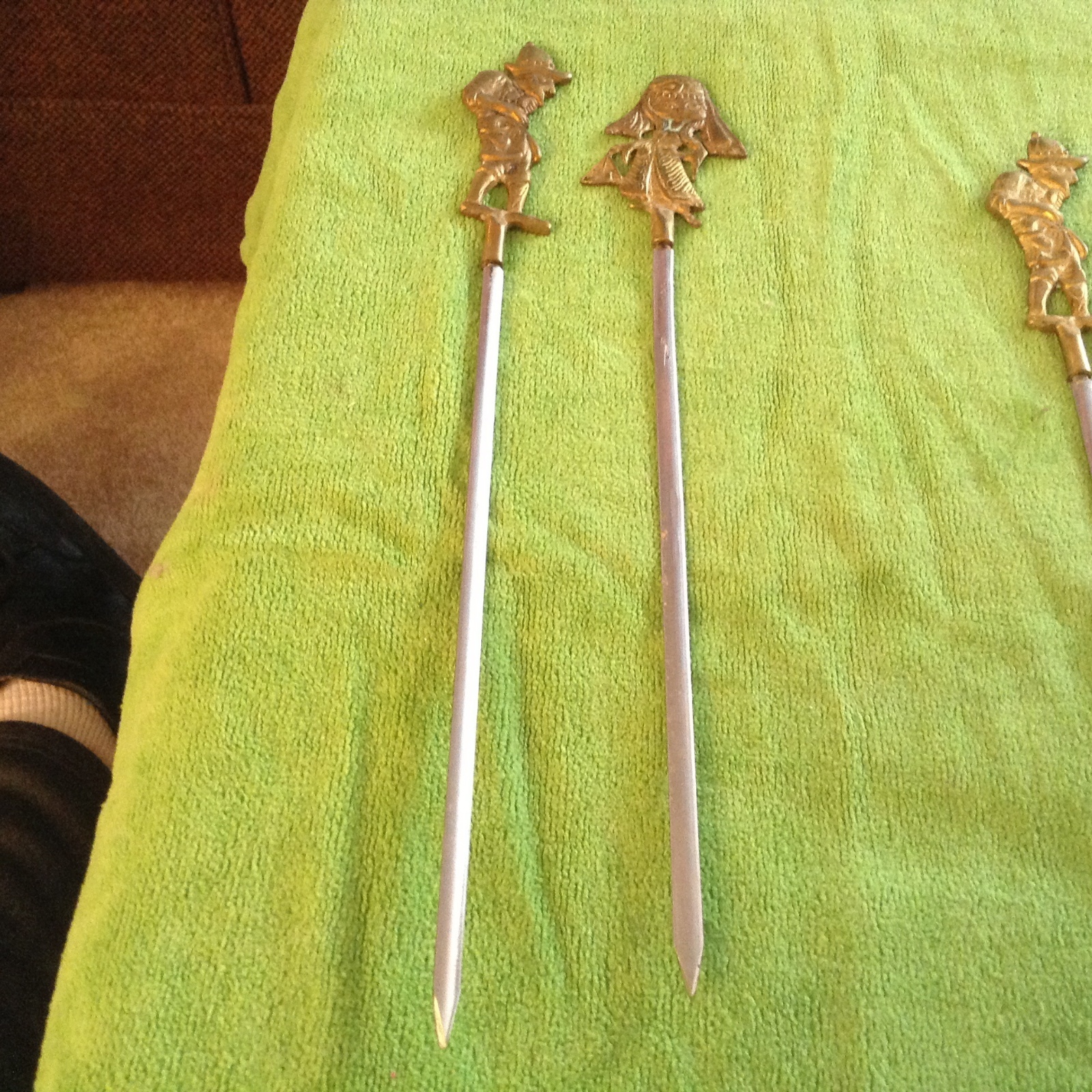 Turkish sword skewer type things with men and woman on top