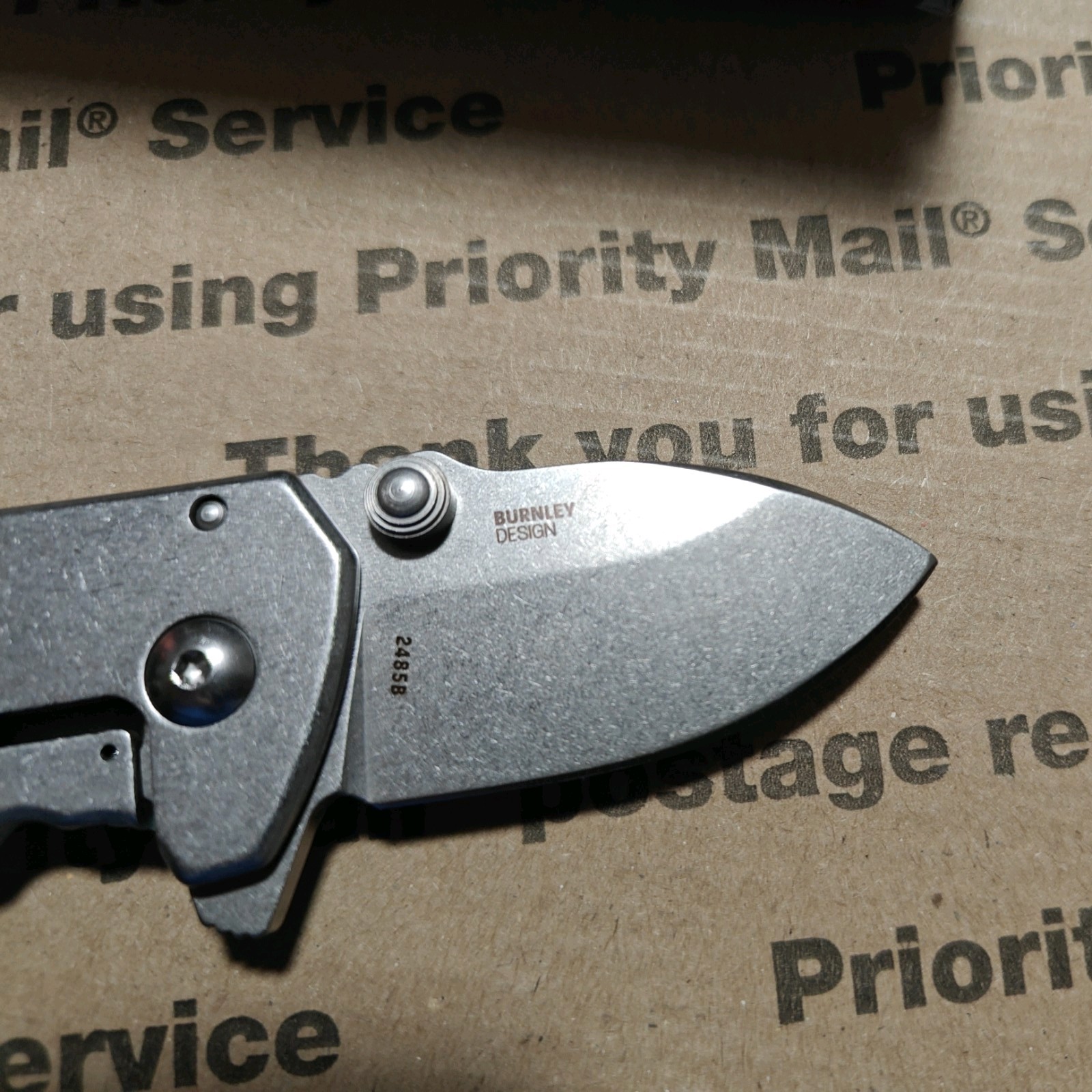 CRKT 2485B SQUID Compact 1.75″ Folding Drop Point Plain Stonewashed D2 Steel.