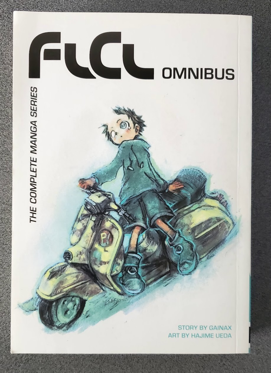 FLCL Omnibus: The Complete Manga Series by GAINAX Paperback graphic novel book