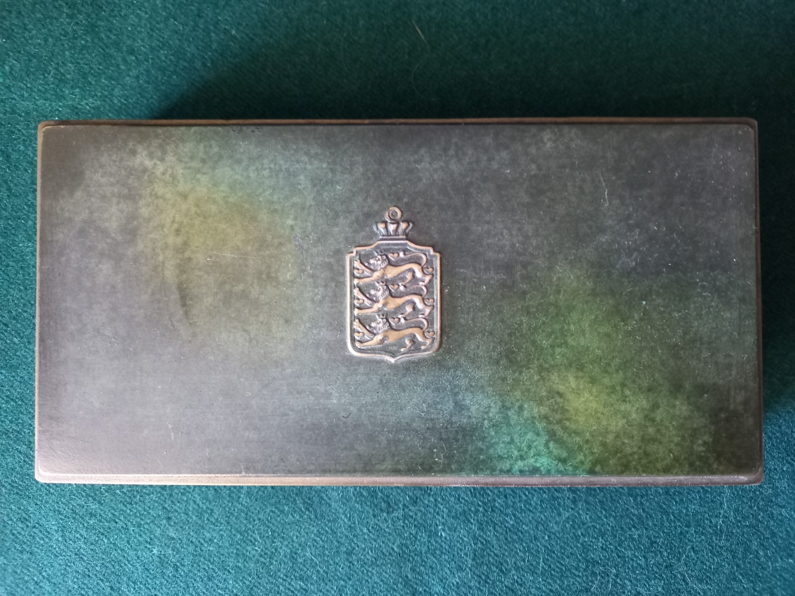 Bronze patina Ildfast box with the coat of arms of Denmark.