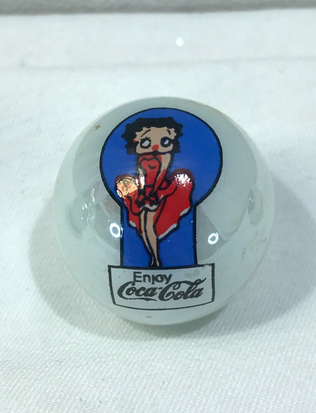 Betty Boop soda advertising marble, white glass shooter marble, 7/8″, 1 piece