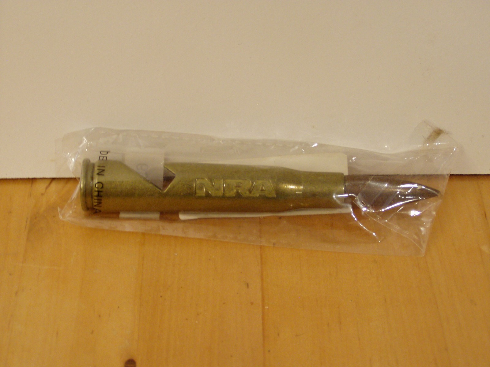 Replica 50 Cal. Bottle Opener By NRA