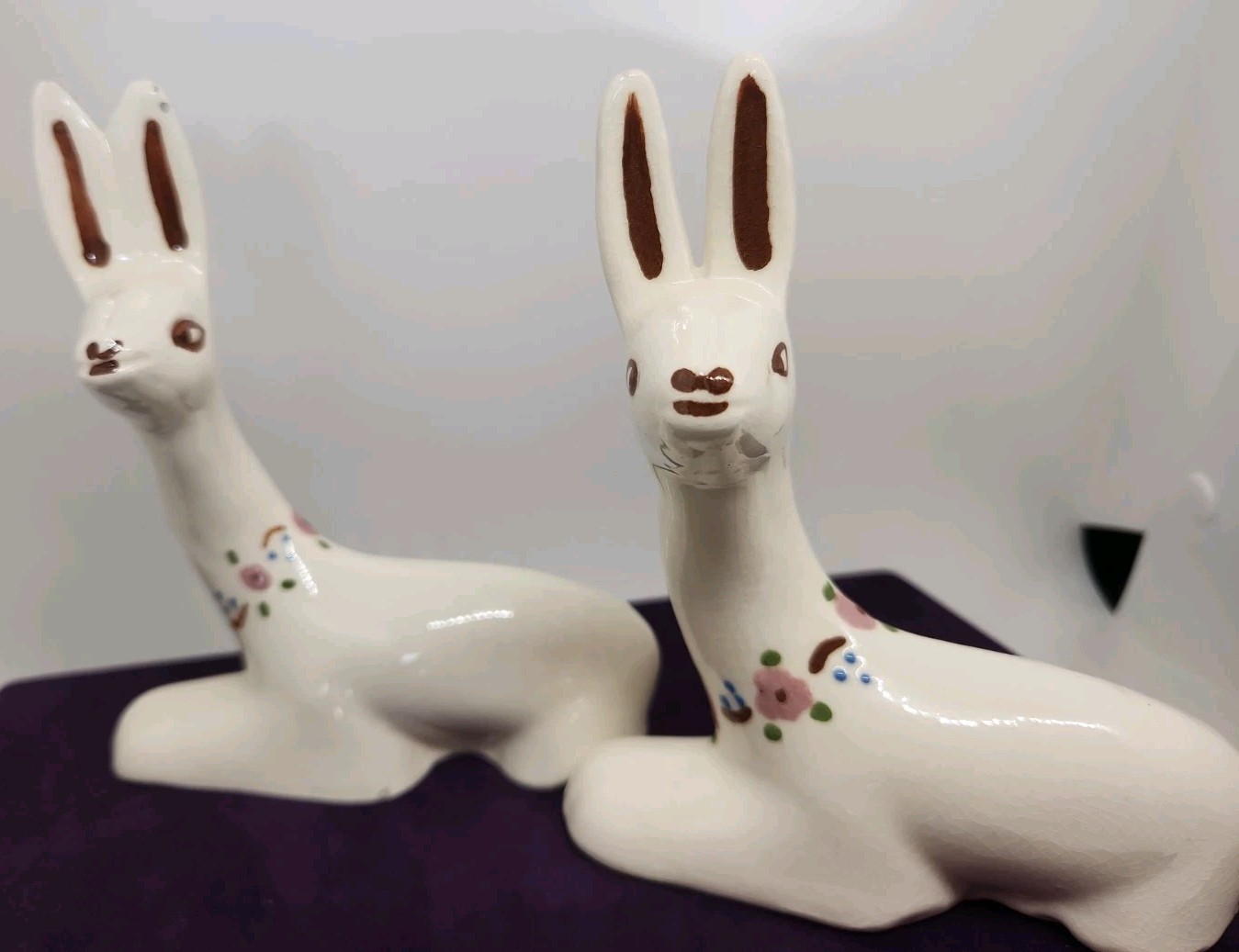 Vintage ceramic deer figurine with painted floral accents. “T” & “W” Marking.
