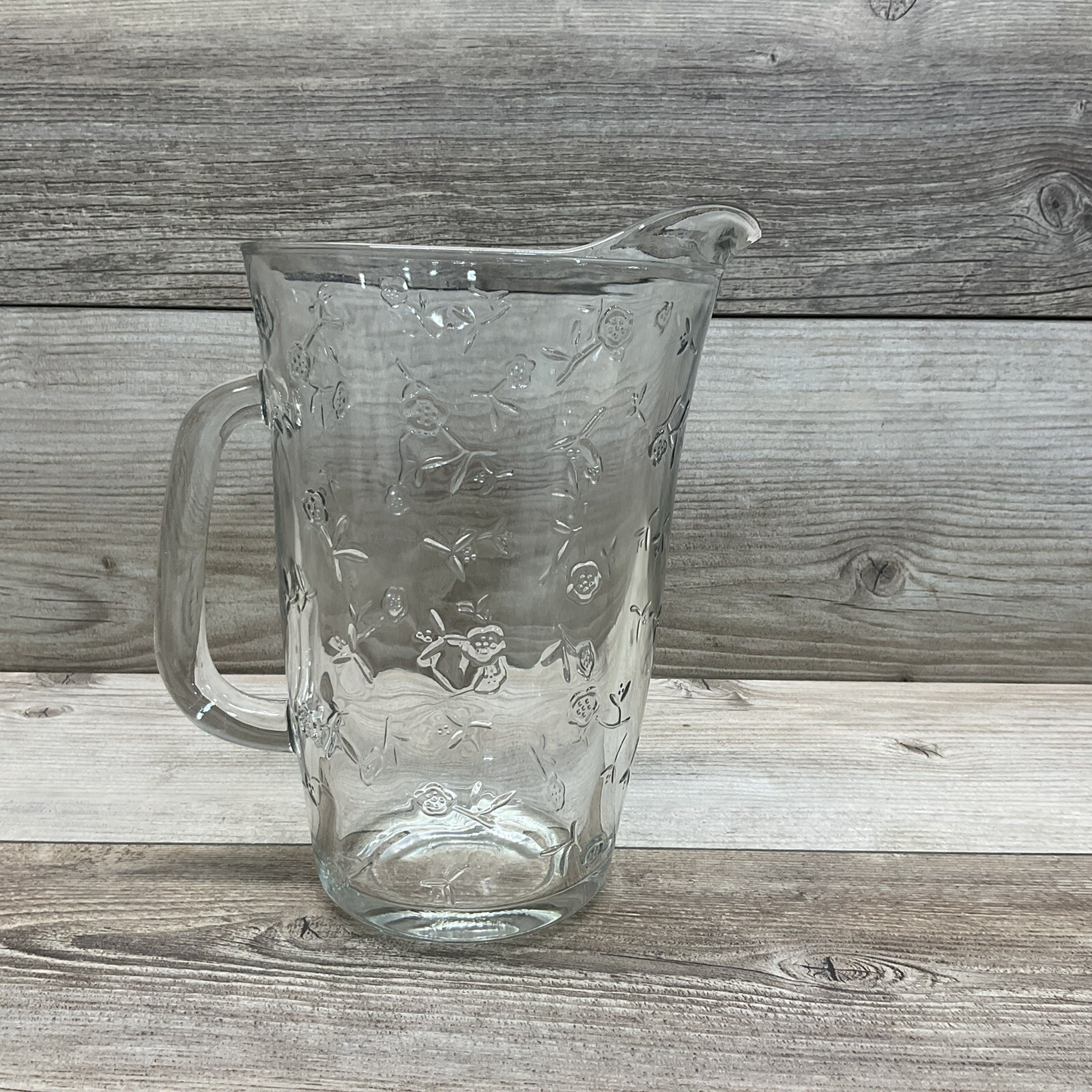Clear Glass Beverage Pitcher With Raised Flowers All Over, No Brand