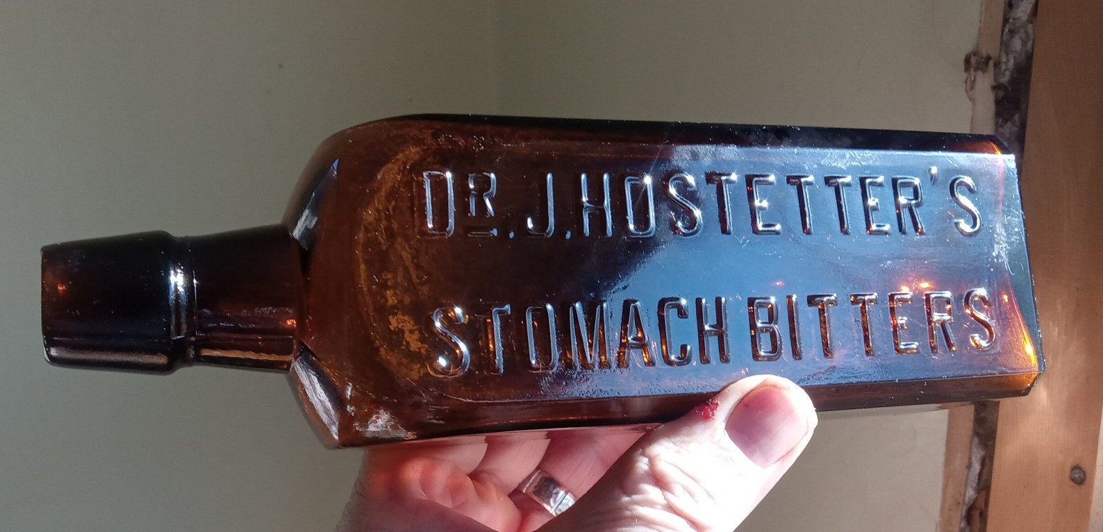 DR.J.HOSTETTER’S STOMACH BITTERS WITH 18 FLUID OZ EMB ON BACK 1917 MACHINE MADE