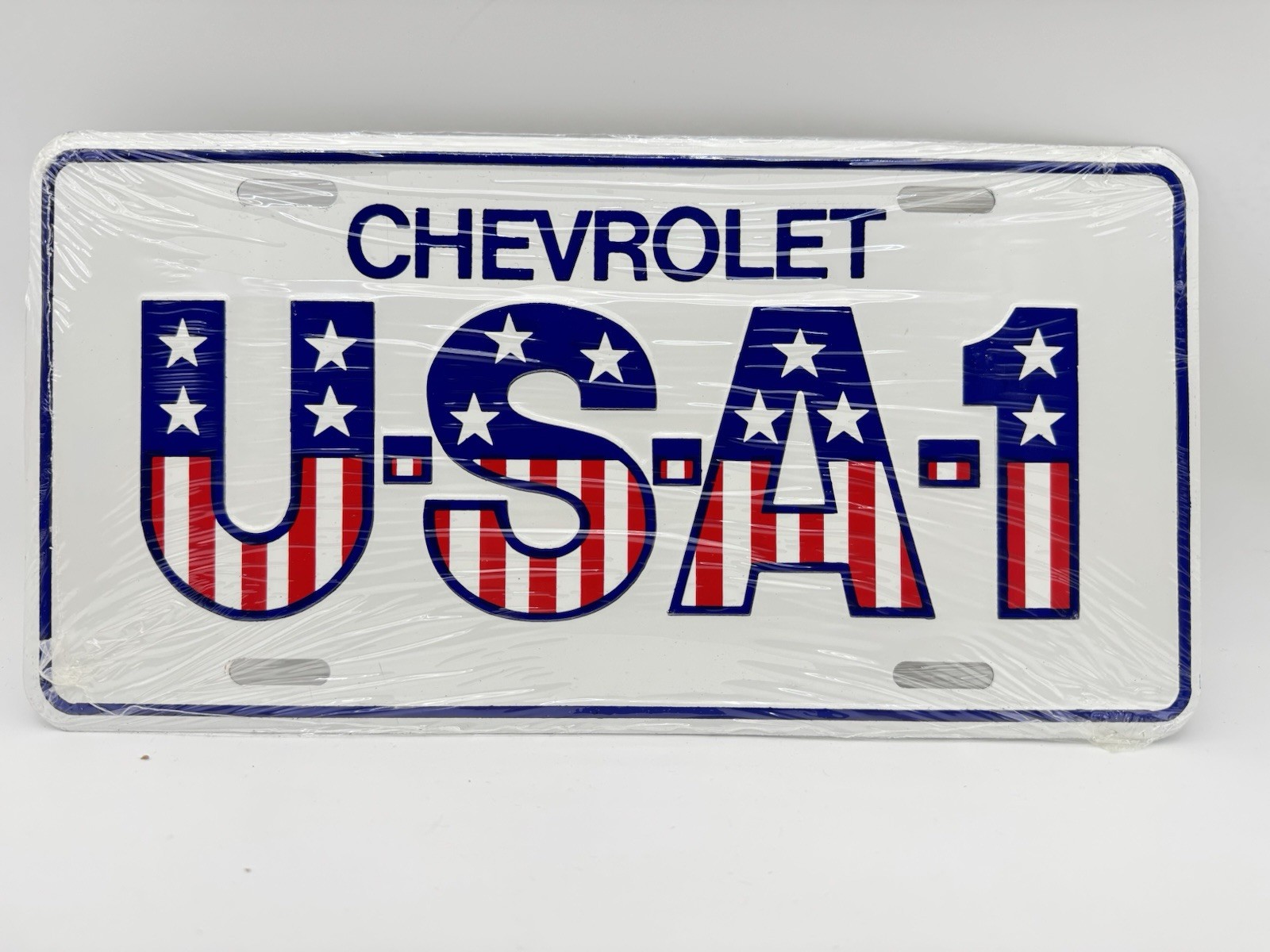 VTG Chevrolet Chevy DEALER USA 1 Stars & Stripes License Plate Embossed