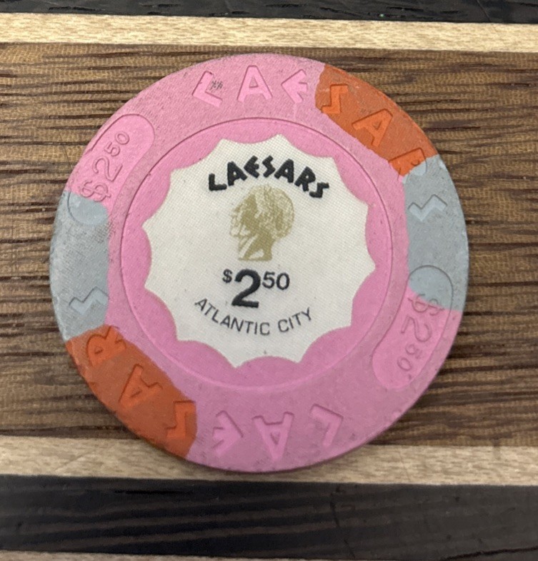 $2.50 Casino Chip from Caesars Hotel & Casino in Atlantic City, New Jersey