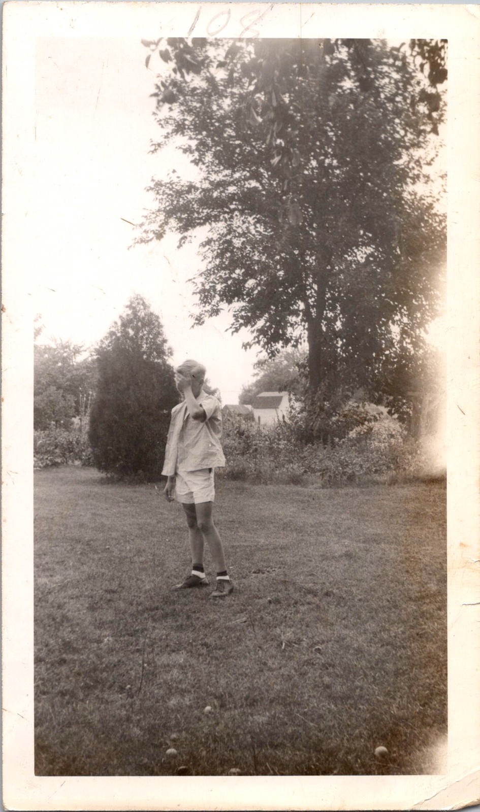 Vintage 1940s 1950s Snapshot Photo Young Boy in Shorts Outdoor Yard