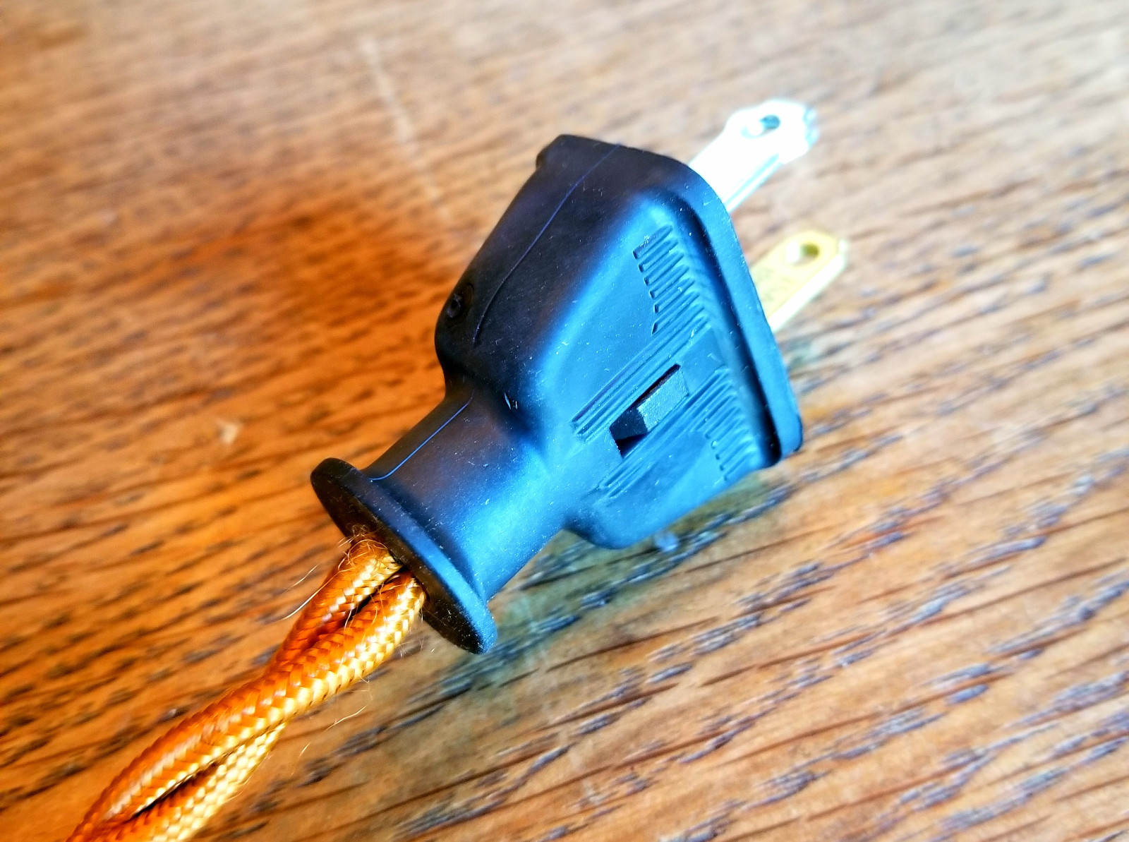 2 Prong Electrical Plug – Black rubber shell, polarized male plug connector