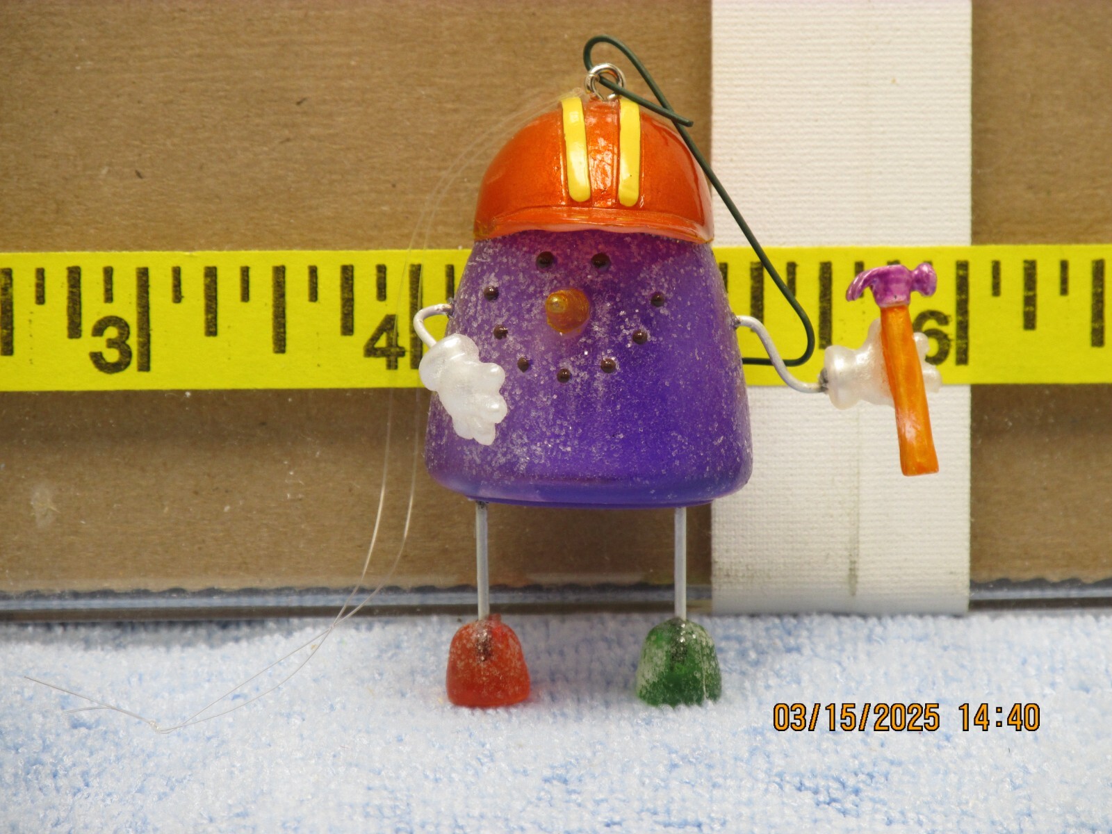 The listing is for:(1)Purple Gum Drop Handyman Christmas Tree Ornament
