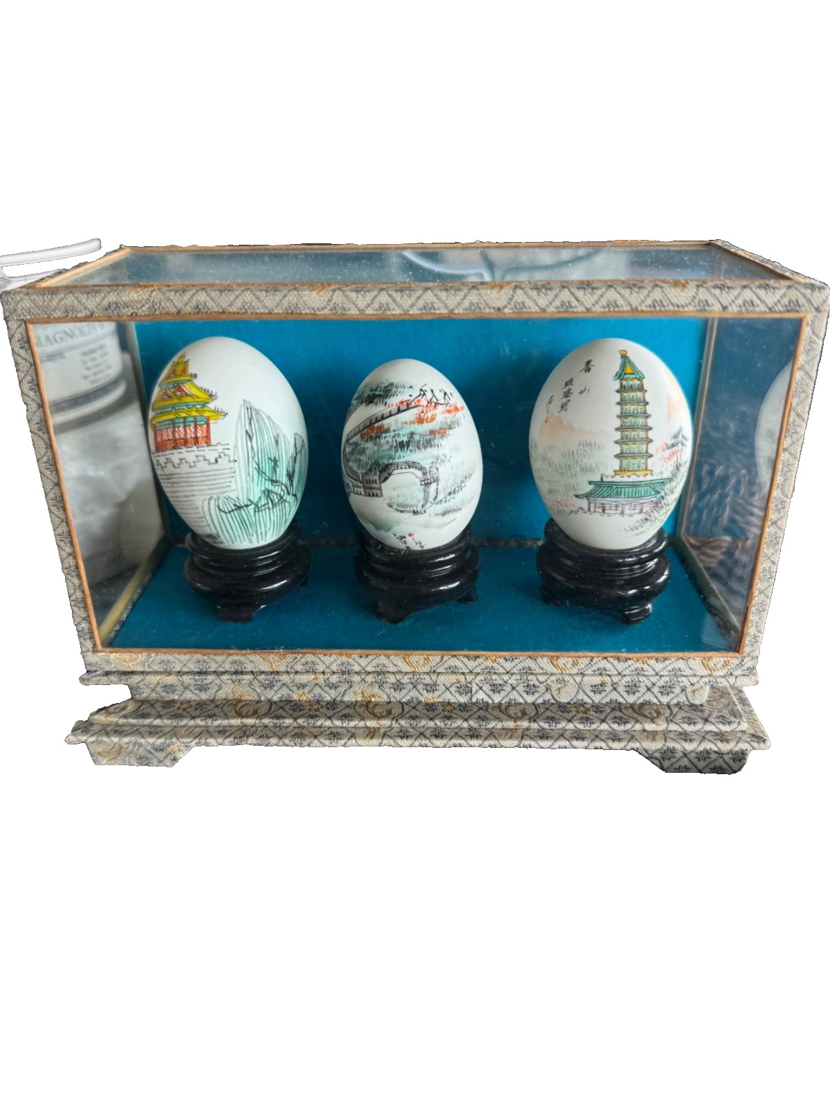 Vintage oriental 3 hand painted eggs with display case