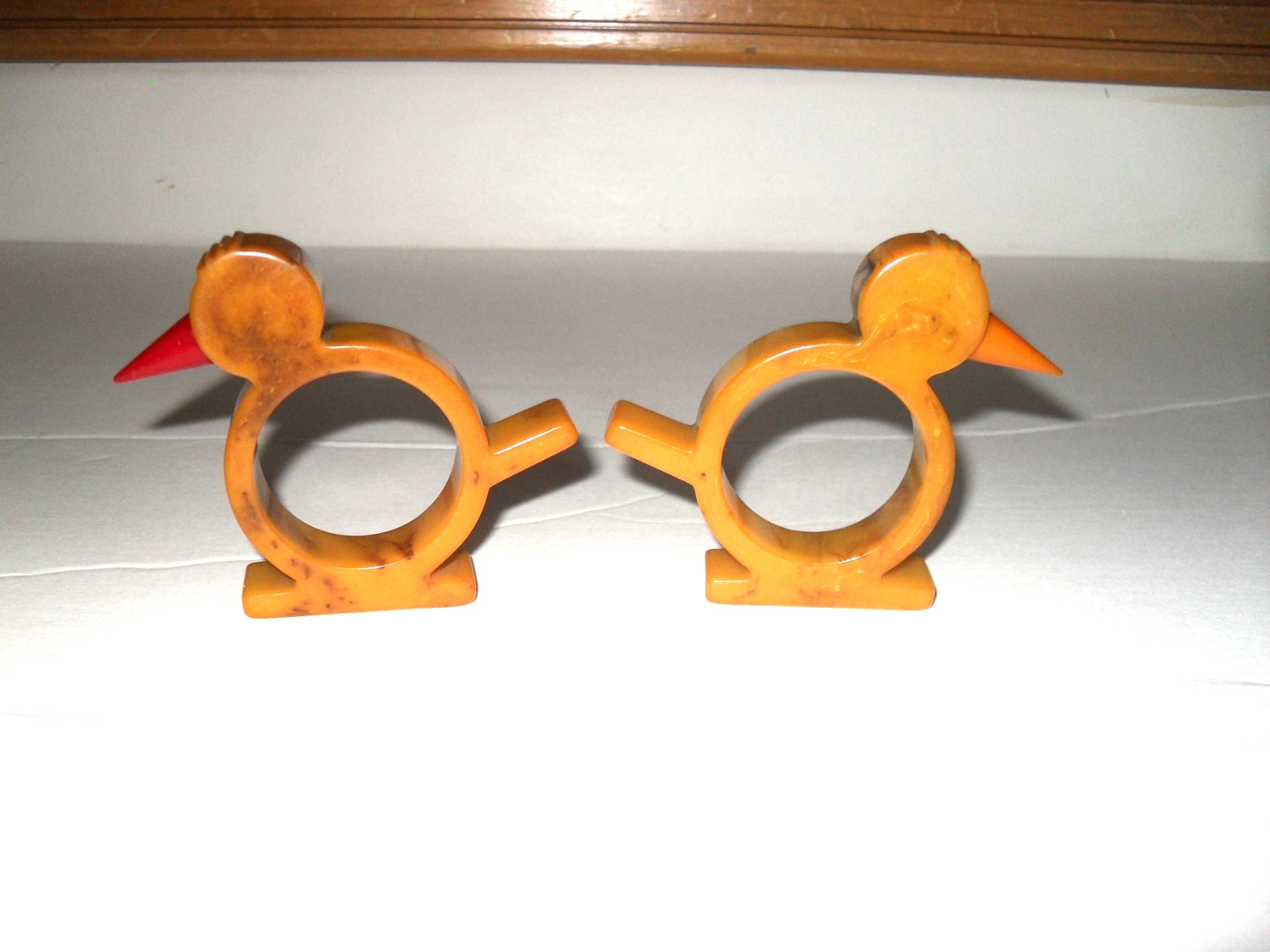 Vintage Pair Bakelite Napkin Rings Bird Chick Duckling Butterscotch One Red Beak