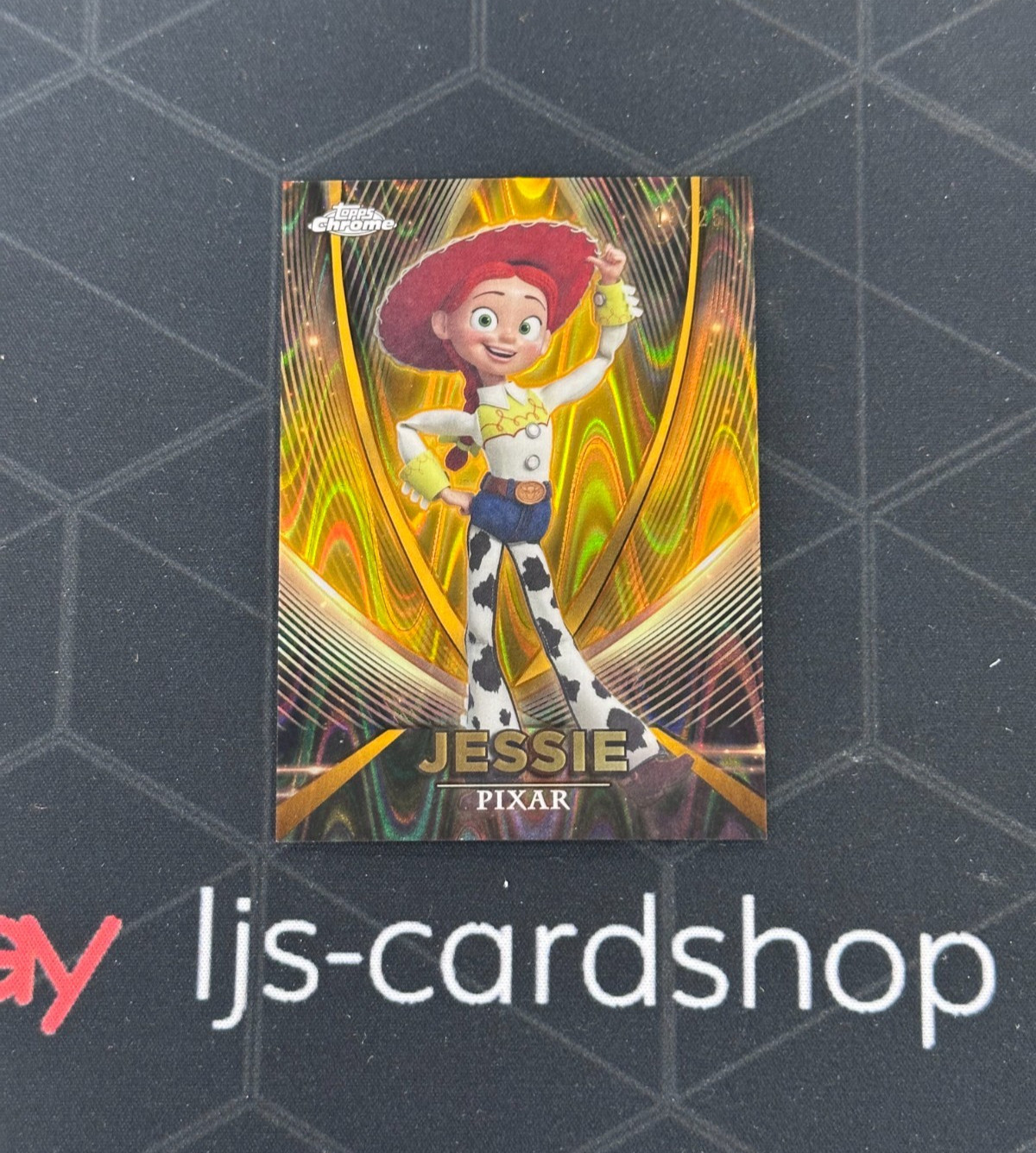 2025 Topps Chrome Pixar Gold Jessie Pixar Gold Ray Wave Etch /25 Encased