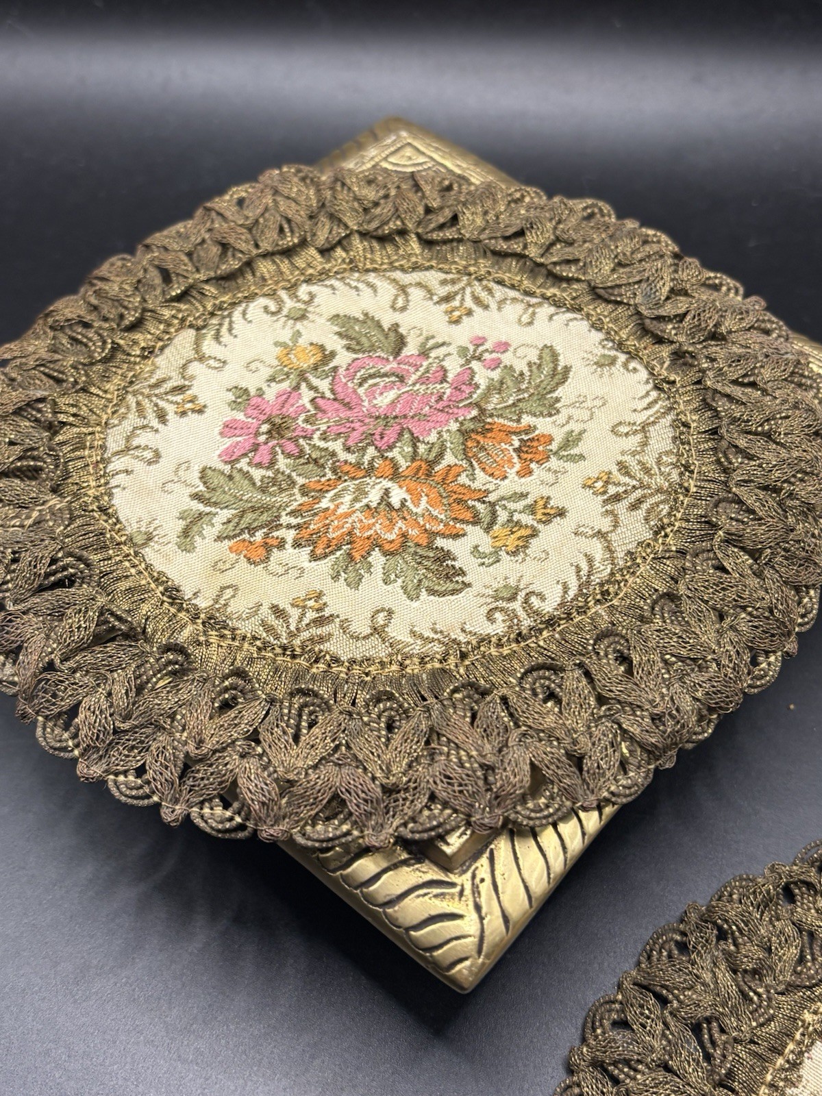 2- GOLD METALLIC THREAD EMBROIDERED TABLE DOILIE. RED LINING. FLORAL DECORATION