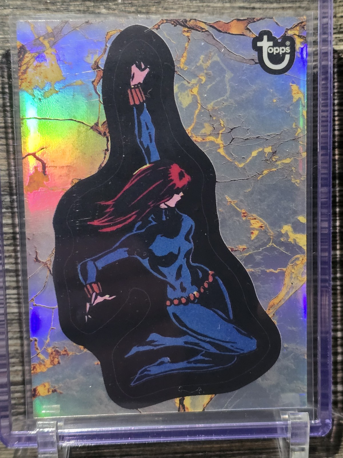 Black Widow 2025 Topps Marvel Comic Book Heroes REFRACTOR 1975 #1 – Chase NM+