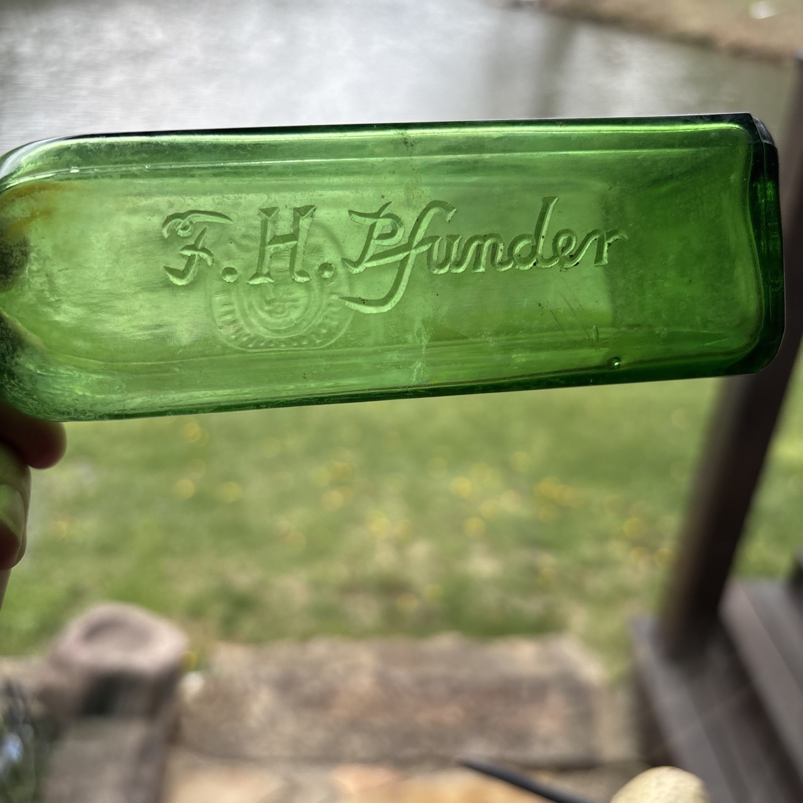 F. H, Pfunder Green Glass Medicine Bottle