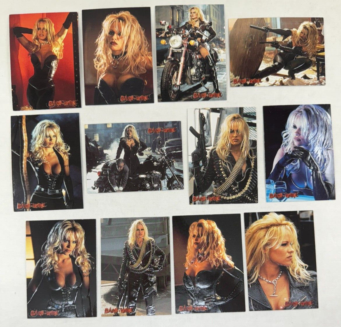 BARB WIRE PAM ANDERSON MOVIE Topps 1996 Complete EMBOSSED Chase Card Set E1-E12