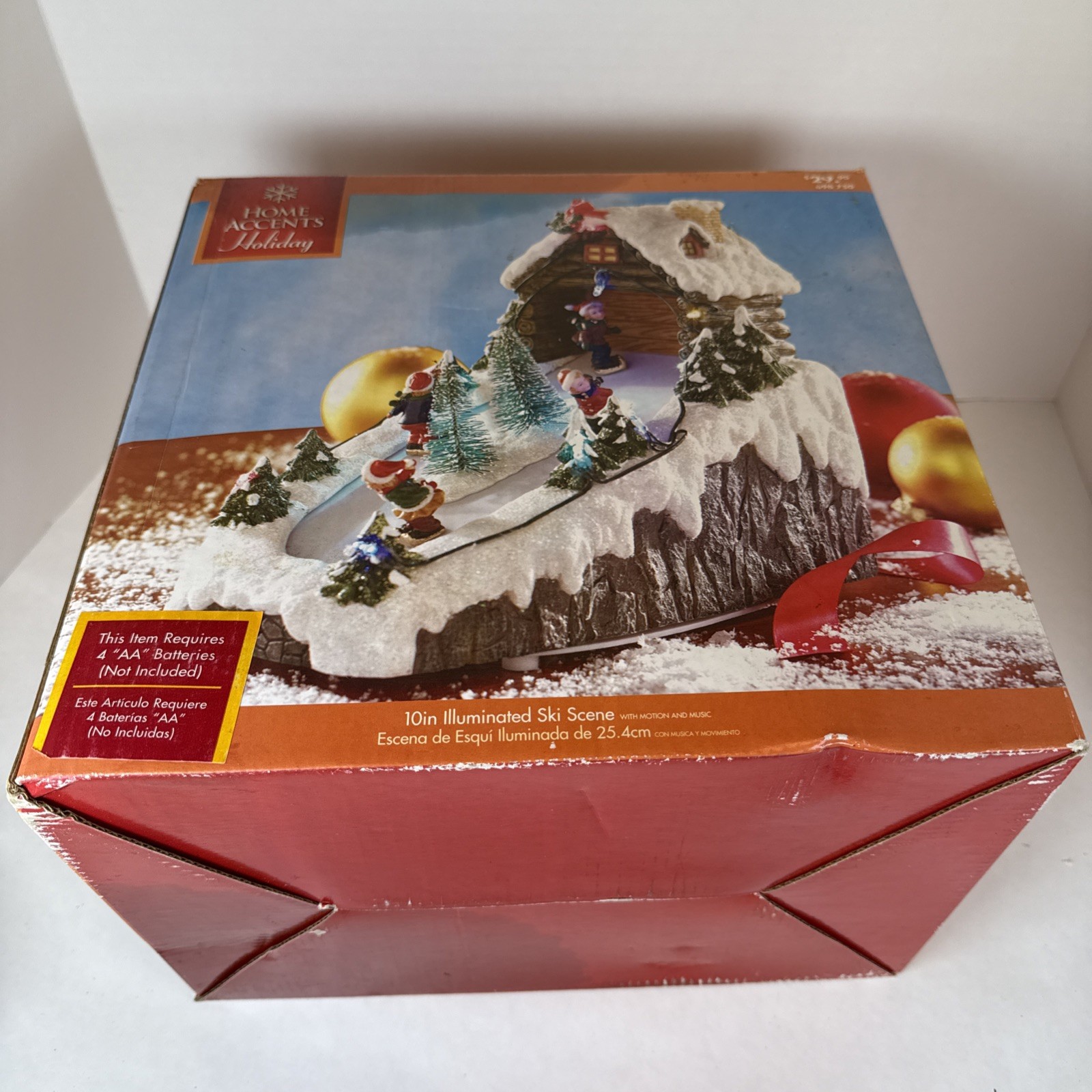 Home Accents Holiday 10″ Illuminated Ski Scene w/ Motion & Music – 4 Figurines
