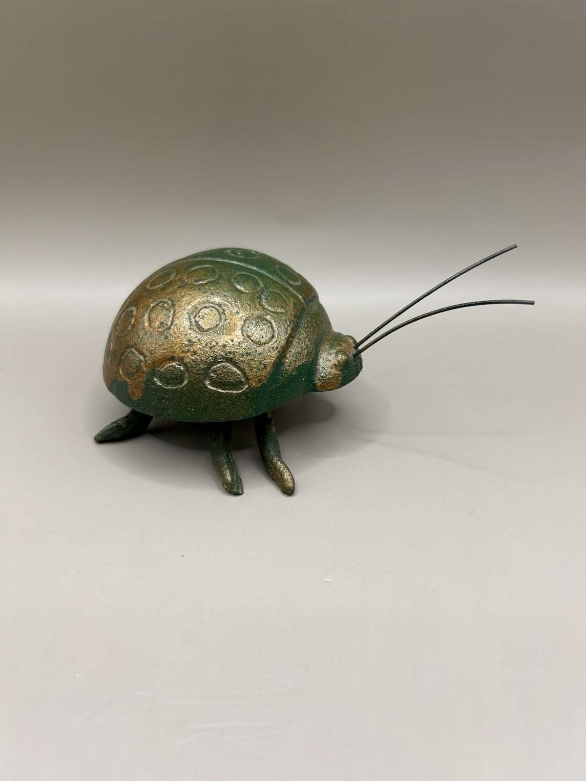 Vintage Cast Iron Ladybug Paperweight with a Green and Bronze patina finish
