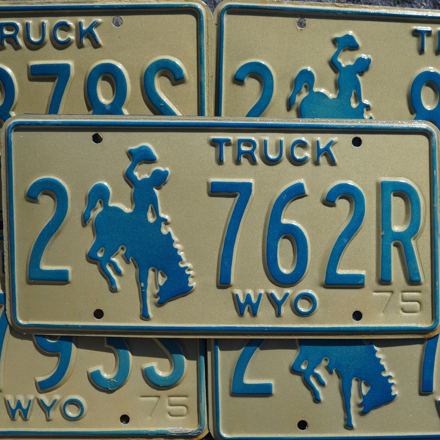 1975 WYOMING LICENSE PLATES – TRUCK BLUE COWBOY HORSE EMBOSSED License Plate Tag