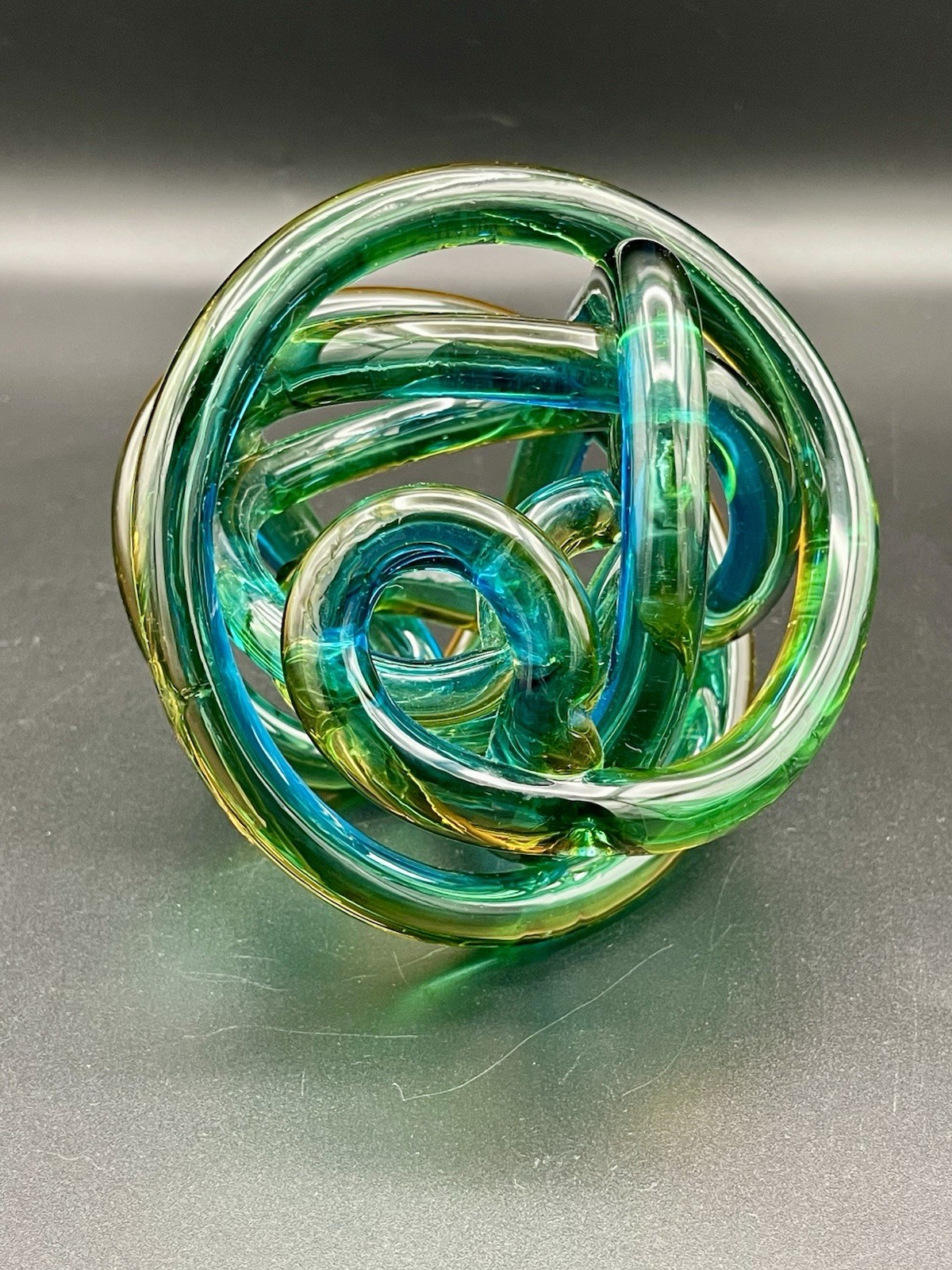 Abstract Art Glass Infinity Knot Sculpture Twisted Rope Iridescent Green Amber