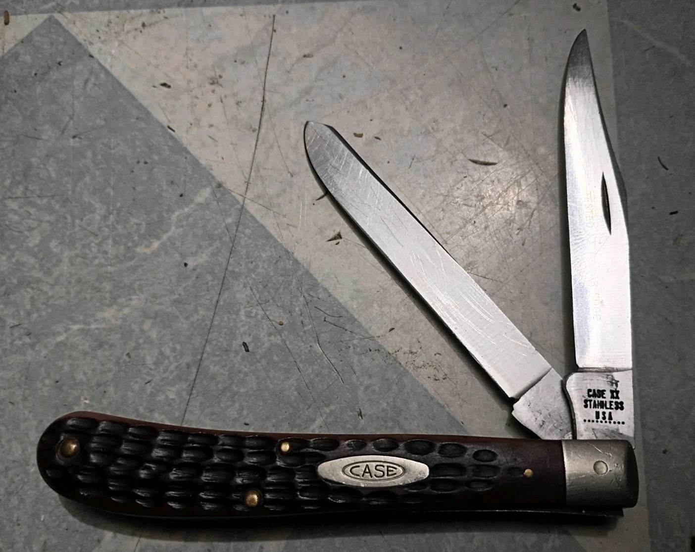 Case XX USA 10 dot 1970 62048 SSP stainless slimline trapper pocket knife jigged