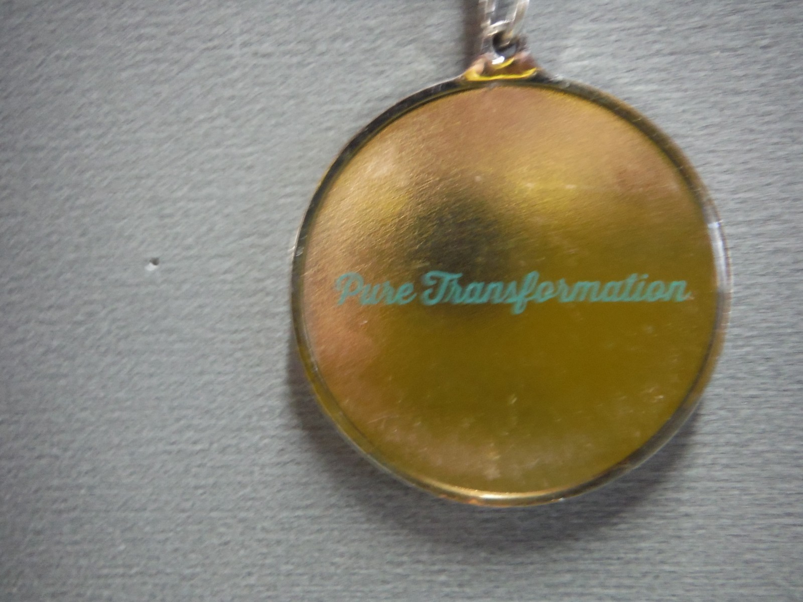 Pure Transformation 2″in Metal Old Collectible Key Chains