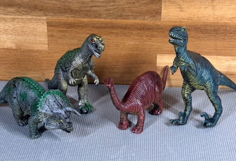 Lot of 4 Dinosaur Figures Ceratosaurus Velociraptor Triceratops Brachiosaurus